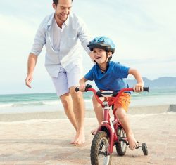 online course: Father with son on tricycle